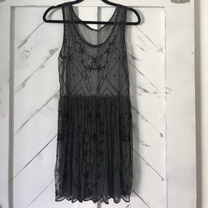 Free People black embellished slip