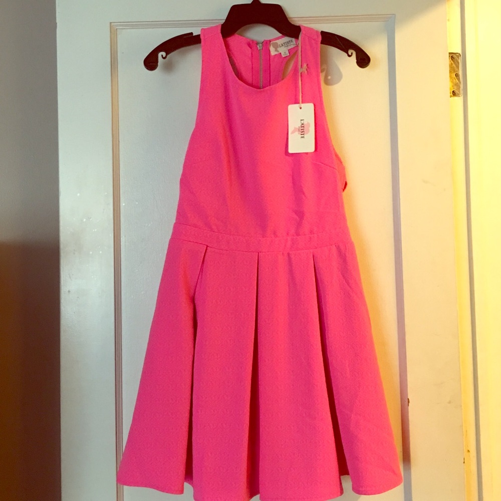 Hot pink party dress with open back.