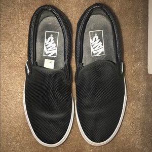 Black leather perforated van slip on.