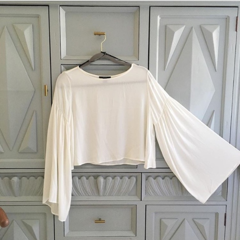 Bell sleeved top