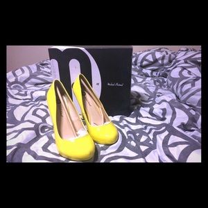 Brand new Michael Antonio yellow heels.