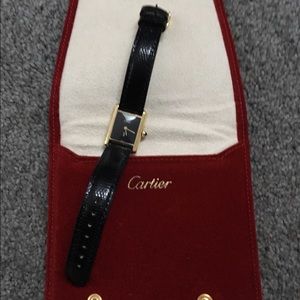 Cartier tank watch. 18k gold. Mint condition