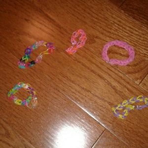 This is 5 very stylish Rainbow Loom Bracelets.