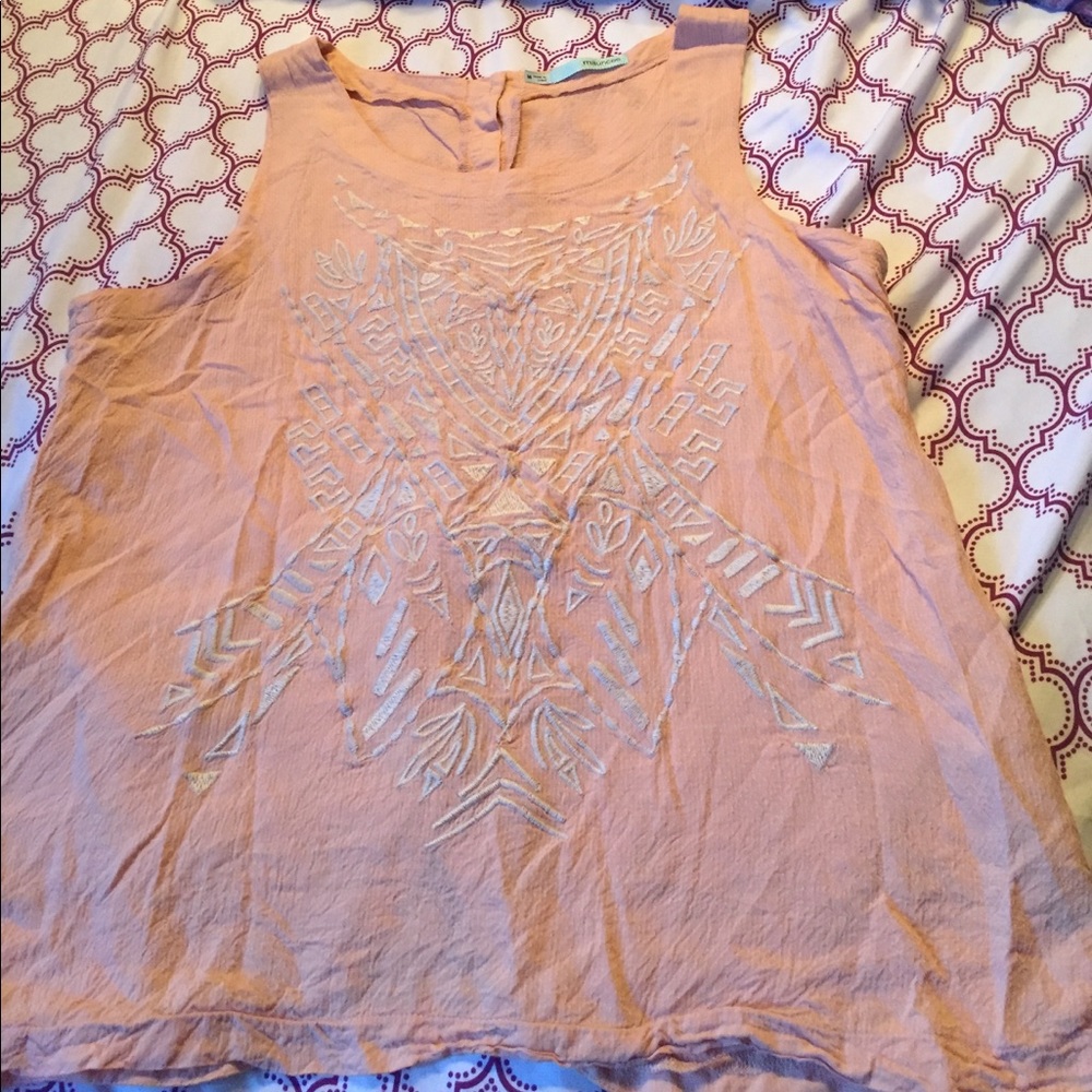 Peach tank with tribal stitching