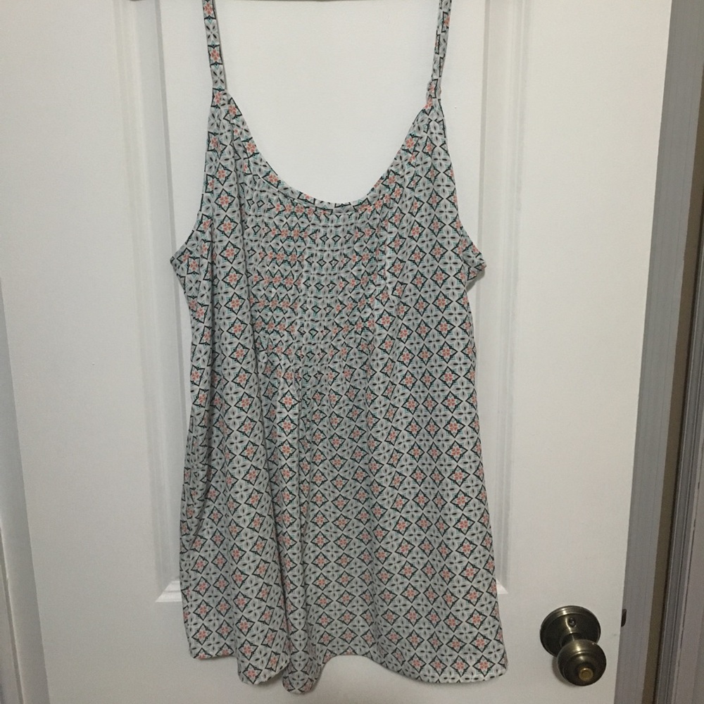 Torrid adjustable spaghetti strap tank top.
