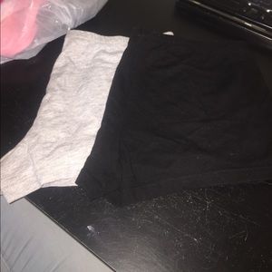 2 booty shorts. One is black the other is gray.