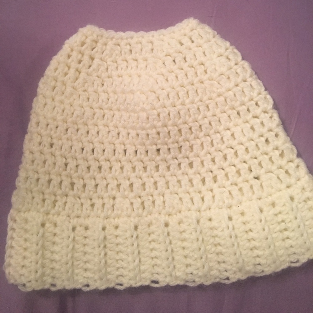 Brand new hand knitted bun hat