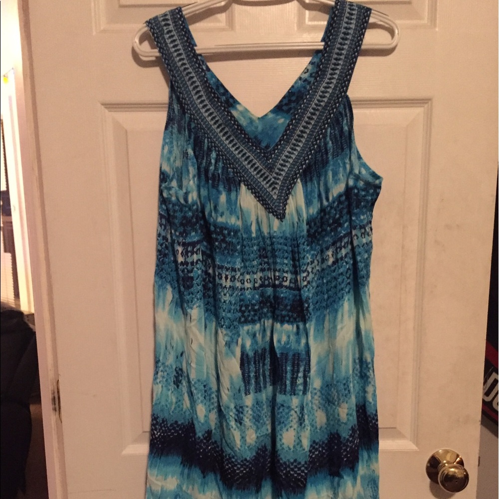 Brand new never worn bathing suit cover.