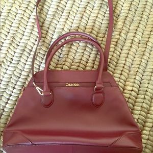 Calvin Klein maroon, cross-body, purse.
