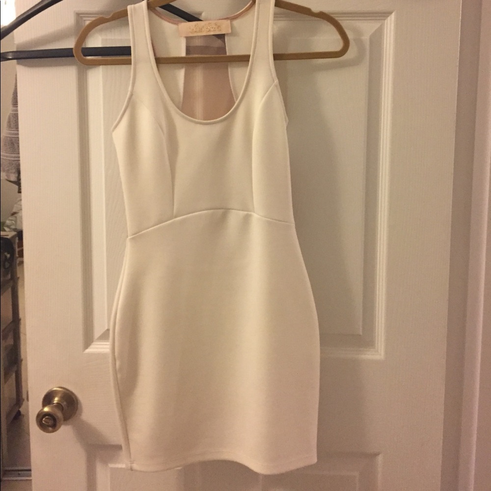 Form fitting white dress