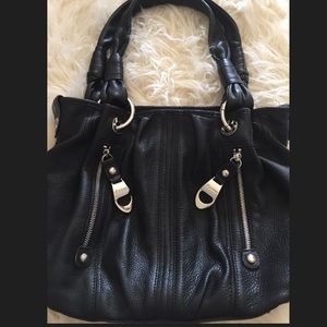 B, MAKOWSKY Black leather handbag.