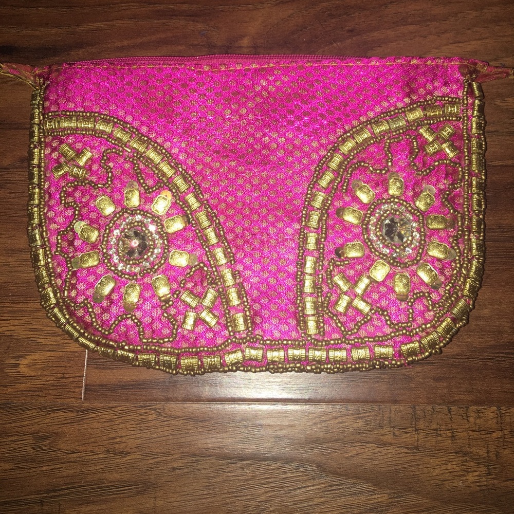 Pink and gold embroidered clutch by Polo