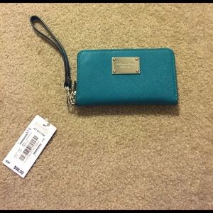 Brand new Michael Kors wallet turquoise !