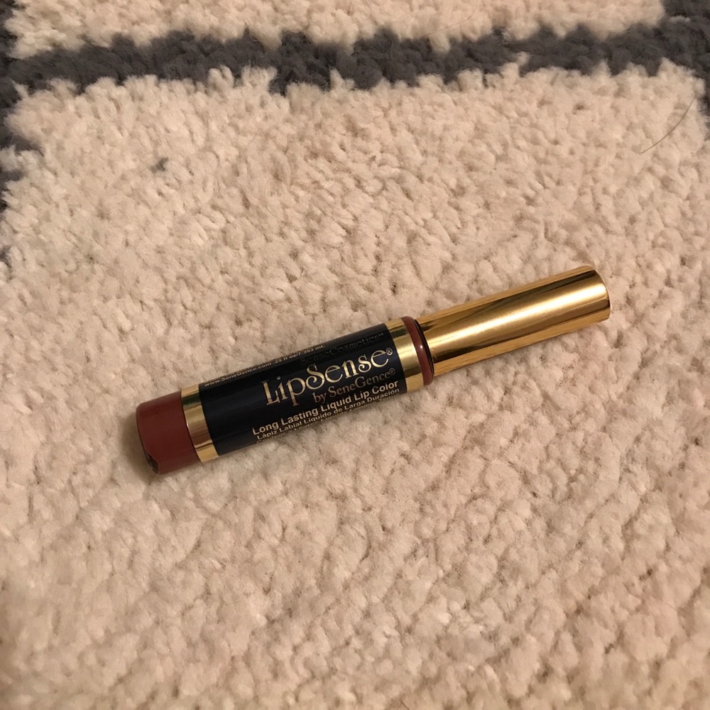 Worn twice lipsense in Currant
