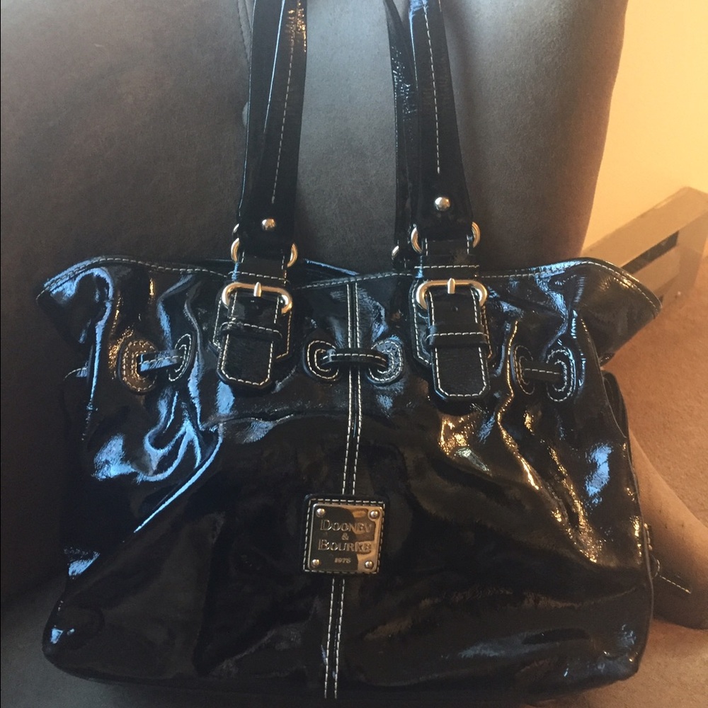 Dooney and Bourke black pattern leather handbag