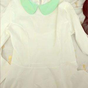 White peplum blouse with mint collar