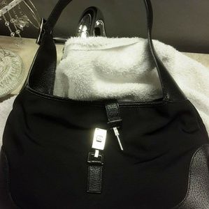 Authentic gucci bag with tags.