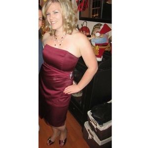 Satin dress with side drape & brooch