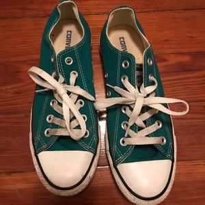 Teal low-top converses