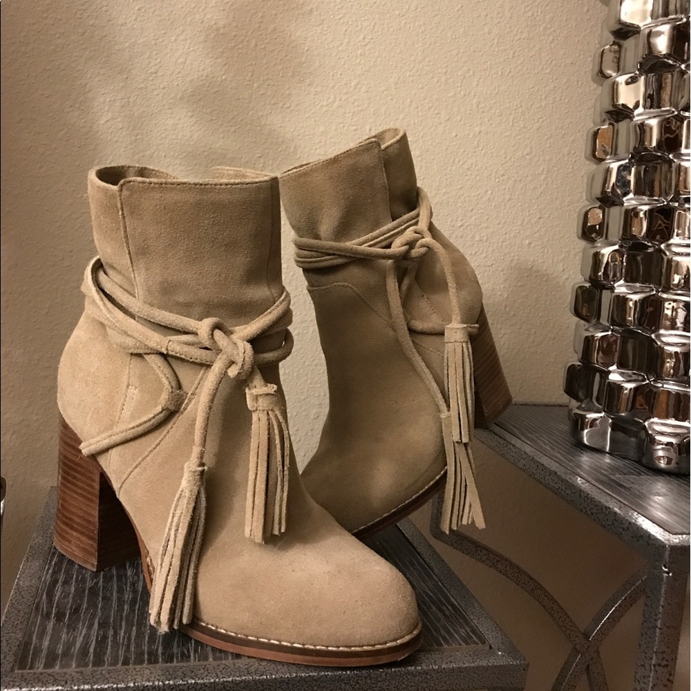 Suede beige tie-across booties. 3" heel size 7.