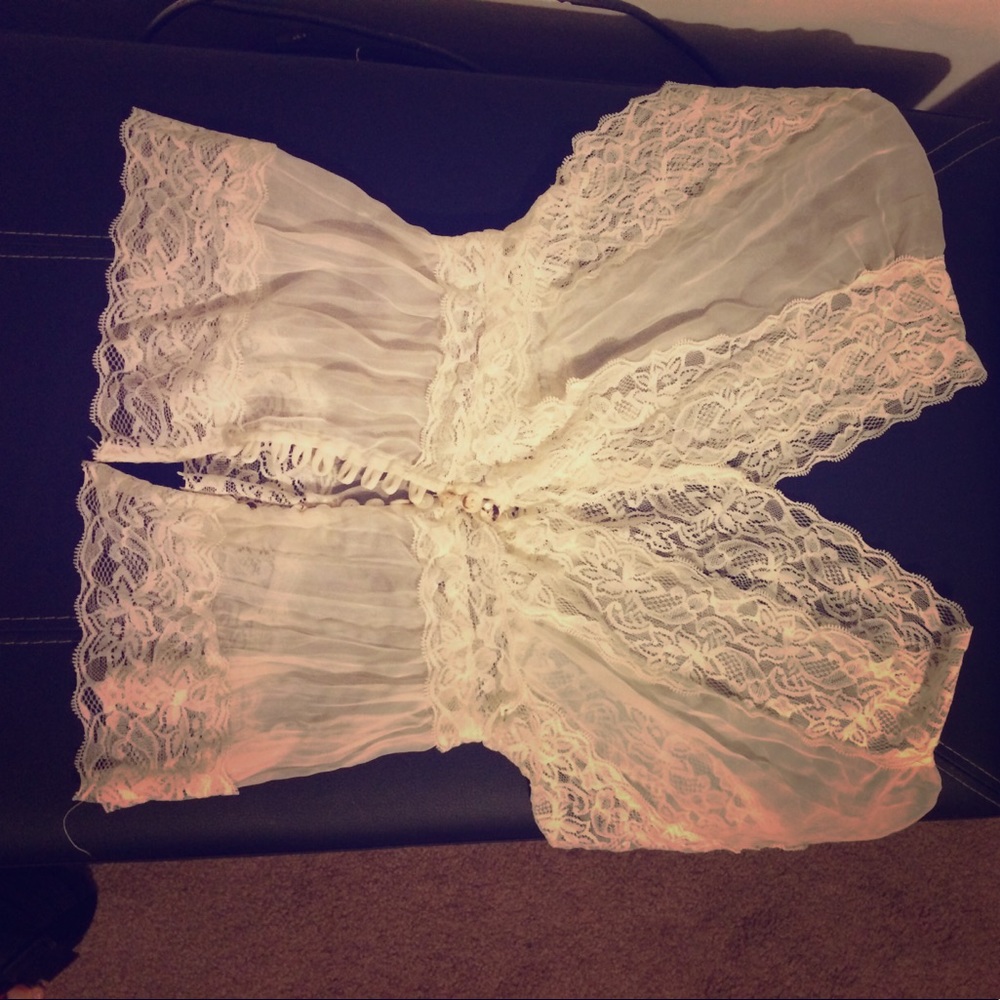 Beautiful sheer white blouse with lace details