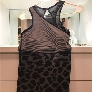 Lululemon grey and black top. Never worn -no tags