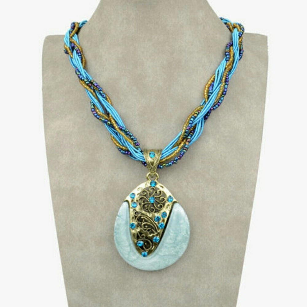 Blue teardrop pendant with braided necklace