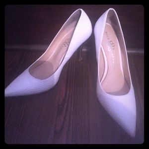 White stilettos with gold heel