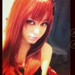 Long wine , fire Red colored wig . Used 3 times