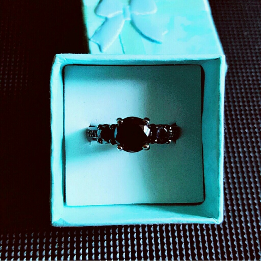 Black Gold.  Lab created black sapphire ring