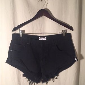 NWOT. One Teaspoon, black denim cut-off shorts.