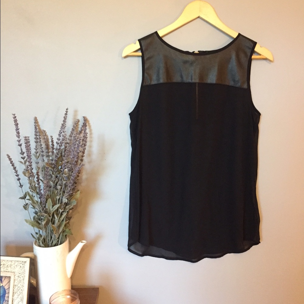 Last chance to buy!  Shear black sleeveless blouse