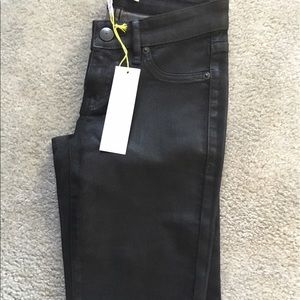 BCBGeneration black coated mid rise jeans.