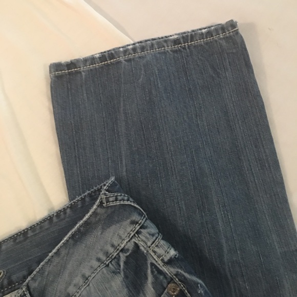 Try on cute distressed jeans by premiere! - Picture 3 of 6