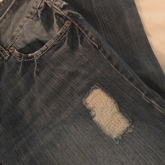 Try on cute distressed jeans by premiere! - Picture 5 of 6