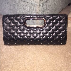 Black and silver dot wristlet