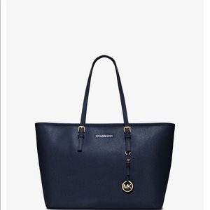 Large jet set travel saffiano leather top zip tote