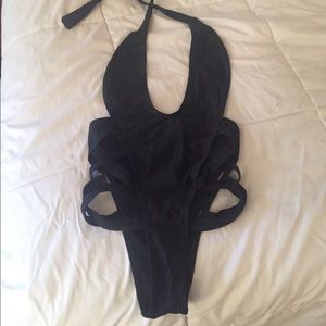 Strappy black one piece suit