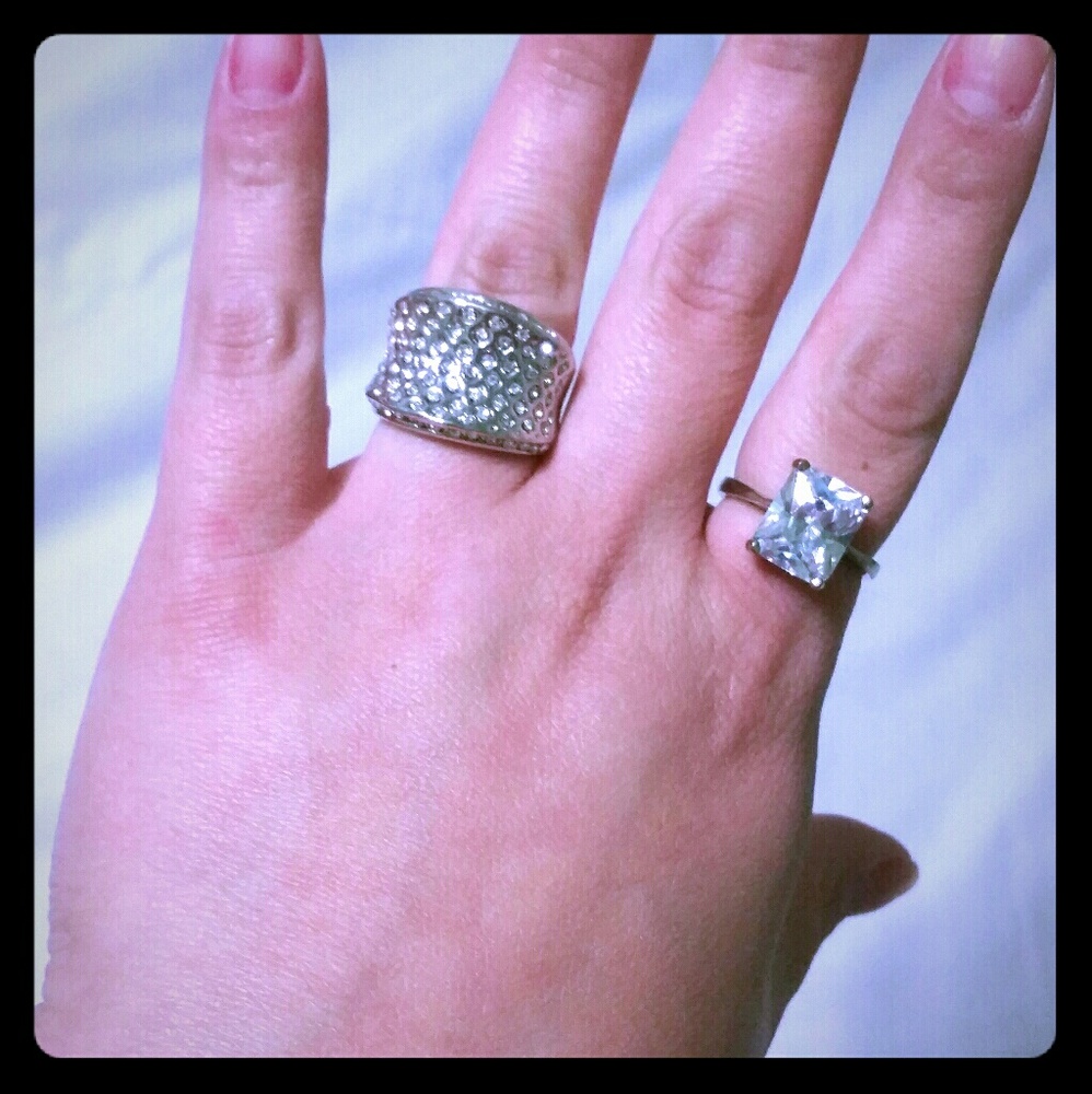 Silver rinestone rings. Both are Size 8.