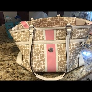 Pink Coach diaper bag I have included the damage