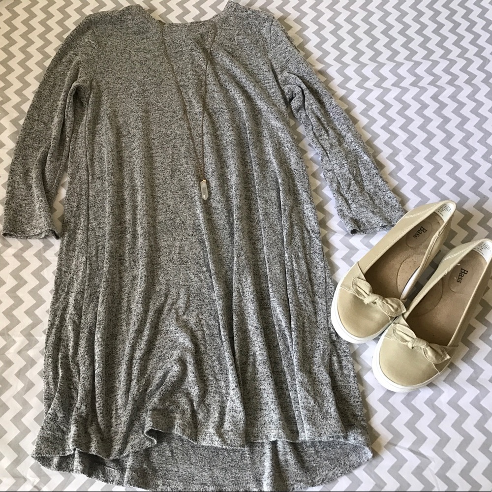 Only worn once tan flats w/ bow at the top