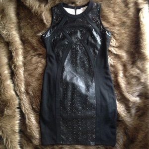 Black dress with faux leather accents