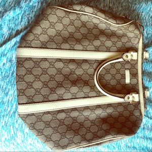 Gucci Bag!! Wear on straps and base leather.