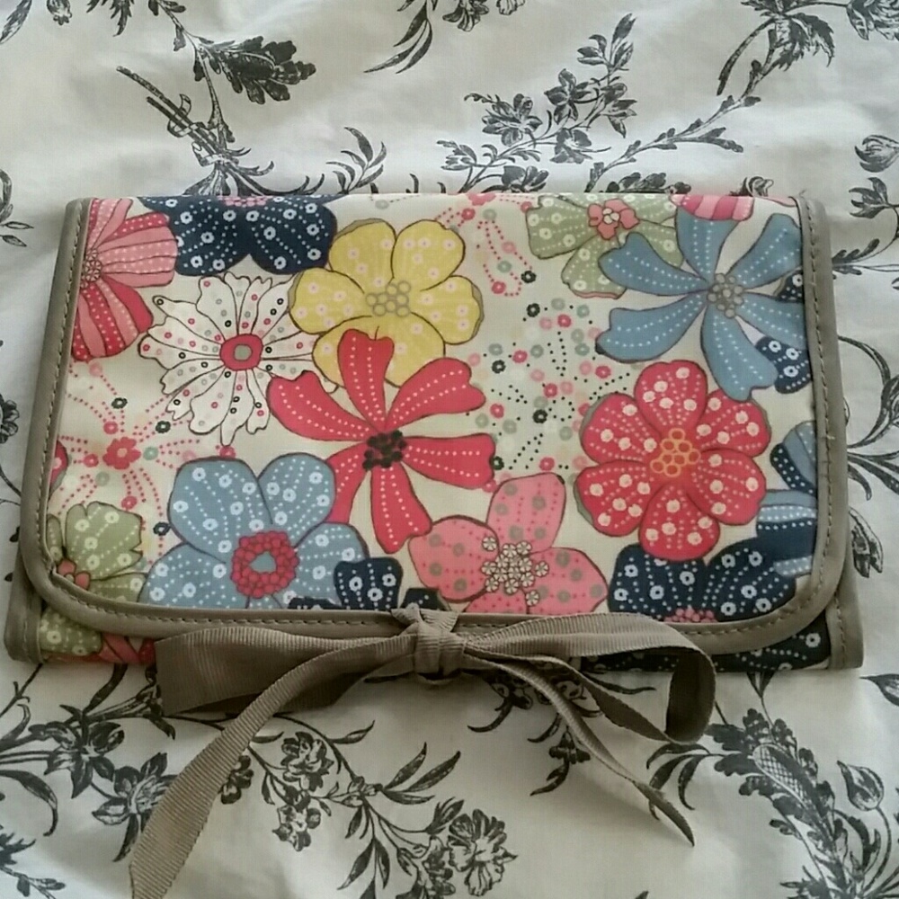 Thirty One brand jewelry or make up travel bag. (Newly marked down then donated)