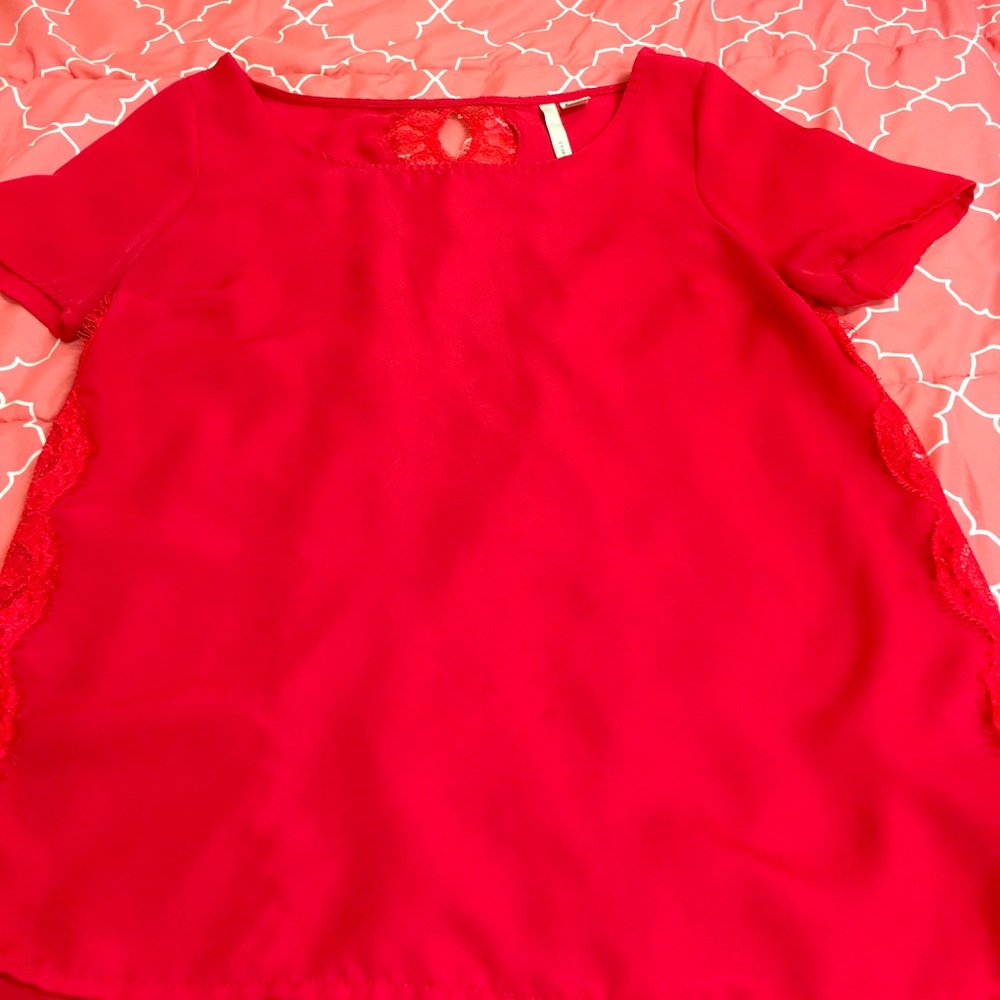 Sheer red top with lace keyhole detailing