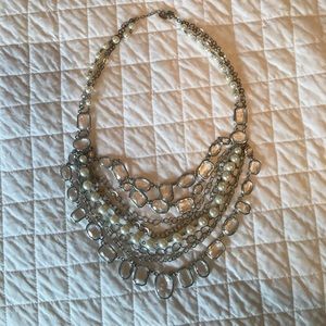 Pearl, silver, and crystal statement necklace.