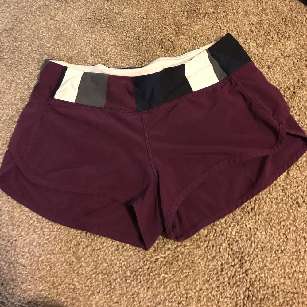 Size 6 burgundy Lululemon 2- way speed shorts