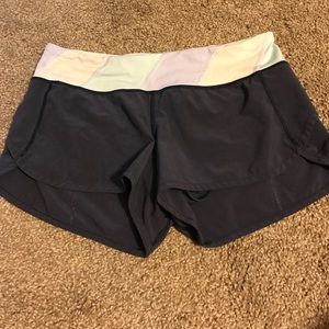 Size 6 navy Lululemon 2-way speed shorts!