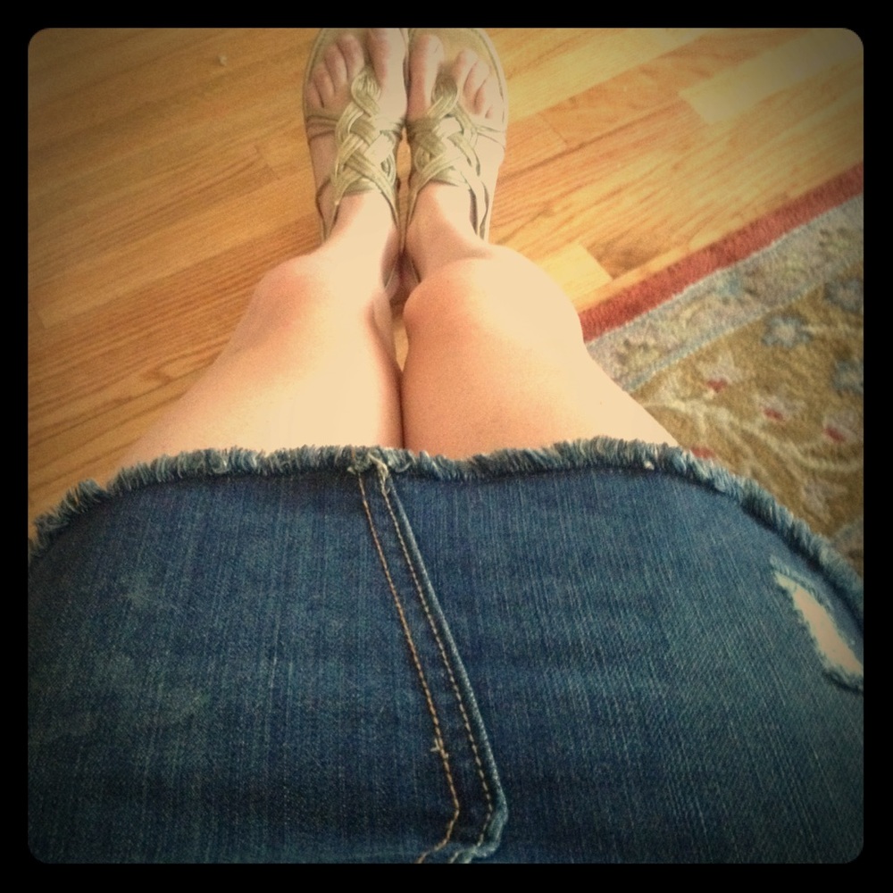 Very well worn gladiator-style sandals.