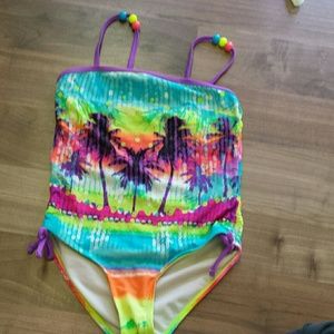 One piece girls bathing suit.